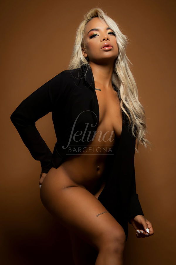 Luxury escort in black blazer at Felina Barcelona, Barbie