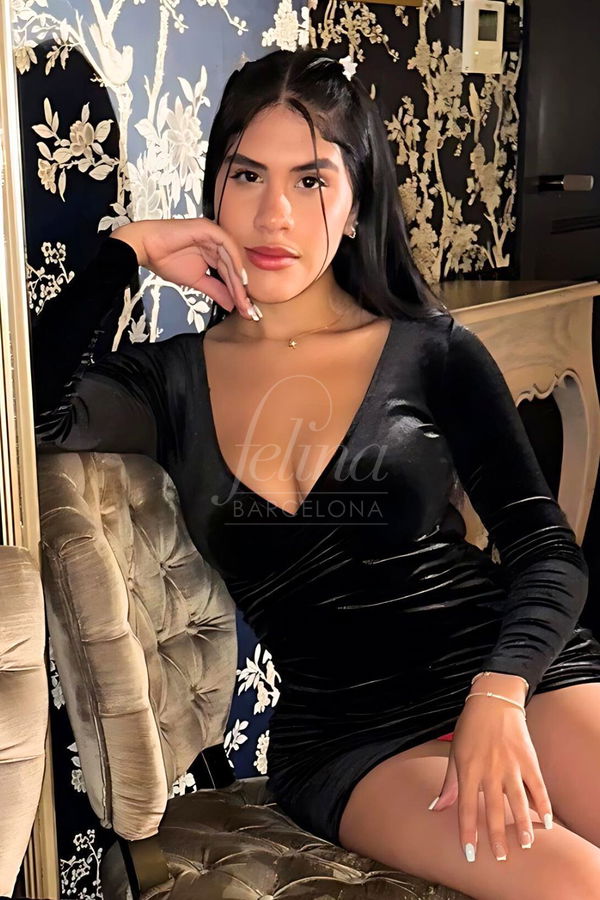 Luxury escort in black ball gown at Felina Barcelona, Mariana